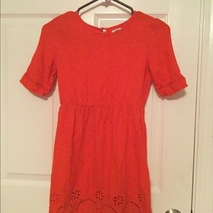Orange/red kids dress.
